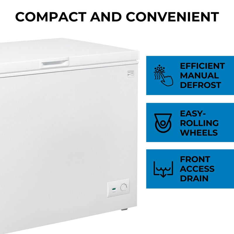 Kenmore chest-style freezer, closed, on a white background. Text above reads, "Compact and convenient," and text and icons beside describe features: Efficient manual defrost; easy rolling wheels; front-mounted drain.